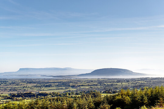N.E. to Knocknarea Mt. beyond Ballysadare Bay, Sligo, Ireland. Early morning. Prehistoric stone cairn known as Queen Maeves Grave visible on summit