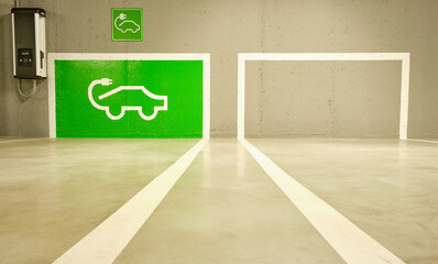 Parking spaces equipped with charging points for electric vehicles, promoting sustainable mobility and energy efficiency