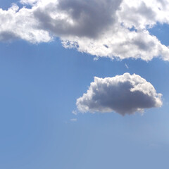 White clouds isolated over blue sky background