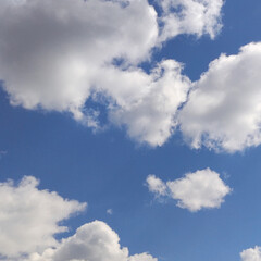 White clouds isolated over blue sky background