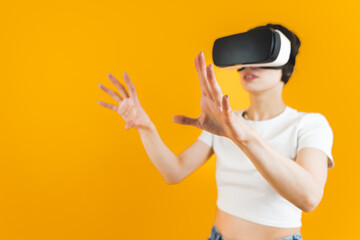 Woman putting her hands forward using a VR headset. Medium shot. Bright background. High quality photo