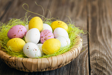 Easter composition with eggs in a decorative nest.