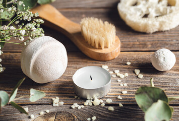 Spa composition with bath bomb, candle and dried flowers. - Powered by Adobe