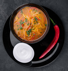 Chicken soup with noodles top view