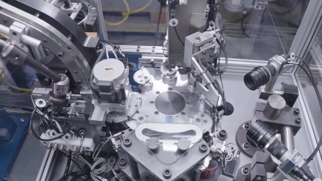 Automated machine. Robotic equipment at factory. Smart robotic. Modern production technologies. High tech machinery plant.