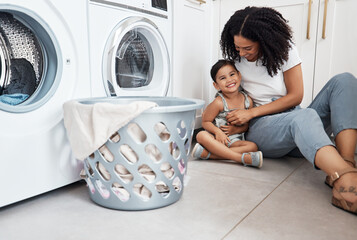Mom, girl child and basket by washing machine on floor for cleaning, bonding and comic time in...