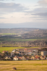 Castles Točn&iacute;k (right) and Žebr&aacute;k (left) in Czech Republic, closer is village Rpety. Photo was taken from 9km distance in February 2023.