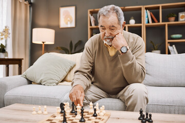 Senior man, thinking or playing chess in house, home living room or apartment in Japanese strategy,...