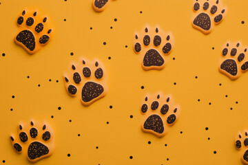 dog paw prints on yellow background Generative AI