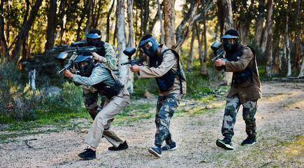 Army, military and people with guns for paintball, shooting game and training in nature. Fitness, teamwork and group of friends playing sporty games, running for battle and target game in a forest