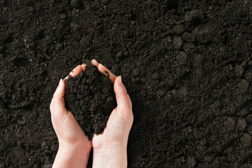 Symbol earth day. Handful of earth in hand. Farmer hands soil ground earth dirt garden soil farm...