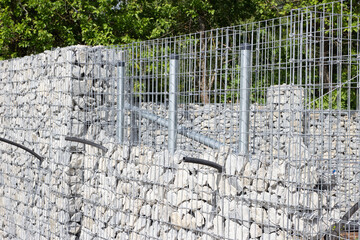 gabion fence under construction