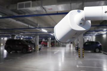 IP CCTV camera security protection system installing parking building car.