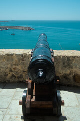 Fototapeta na wymiar Antique cannon in Sines castle. Alentejo, Portugal