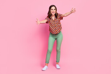 Full length size photo of excited funny smiling girl wear vintage shirt want hug you friendly person enjoy people isolated on pink color background