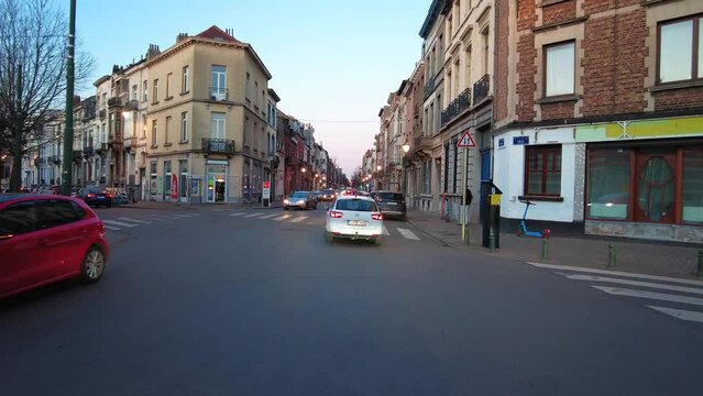 Real time dashcam footage of a car driving on the road in the afternoon in Brussels, Belgium