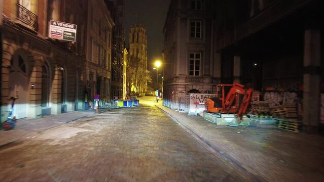 Real time dashcam footage of a car driving on the road at night in Brussels, Belgium