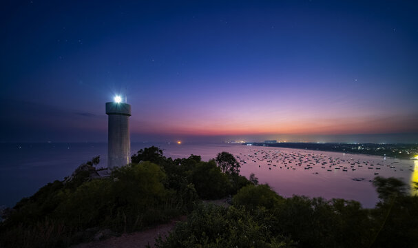 Guangdong Maoming YanJingLing Mountain lighthouse at night