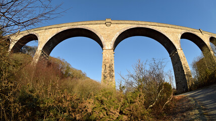 Fototapeta na wymiar Carnon Viaduct, Bissoe, Cornwall - fisheye wide-angle view on a sunny winter morning