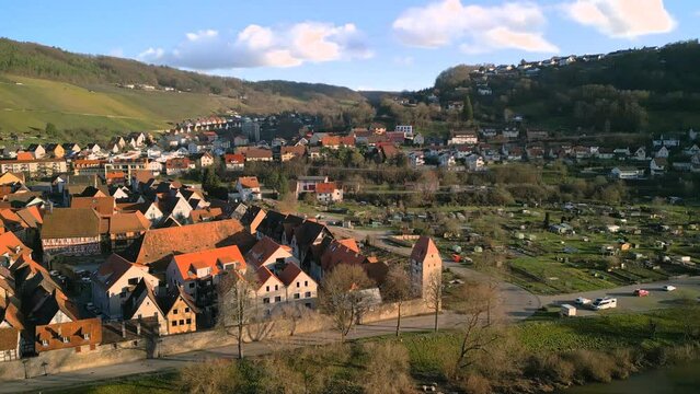 The historic old town of Niedernhall in the Hohenlohe district in the sun and evening mood seen from the air with a drone, Germany