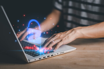Username and password (Login) with biometric identification fingerprint scanner, encryption for technology cyber security internet and networking system. Businessman hand typing notebook (Laptop).