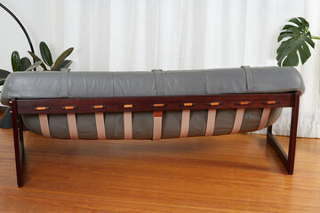 Grey leather Brazian rosewood vintage sofa. 1960s Mid-century Modern living room furniture....