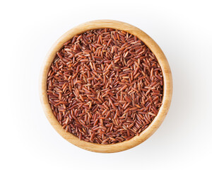 Uncooked red rice in wooden bowl isolated on white background with clipping path