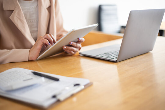 Business Documents, Auditor businesswoman checking searching document legal prepare paperwork or report for analysis TAX time,accountant Documents data contract partner deal in workplace