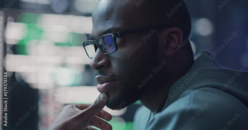Poster Zoom In, Close Up Portrait of Black Man Working on Computer, Lines of Code Language Reflecting on his Glasses. Male Programmer Developing New Software, Coding, Managing Cybersecurity Project