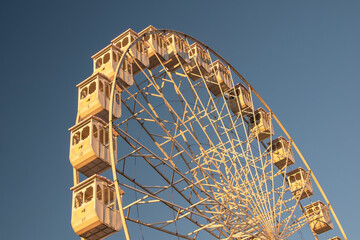 Ferris Wheel over blue sky, Lisbon, Portugal