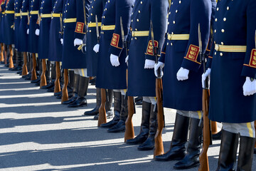 Soldiers of guard of honor during a military ceremony. Selective focus.