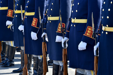 Soldiers of guard of honor during a military ceremony. Selective focus.