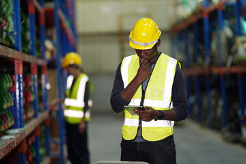 Warehouse workers checking the inventory. Products on inventory shelves storage. .Worker Doing Inventory in Warehouse. Dispatcher in uniform making inventory in storehouse. supply chain concept