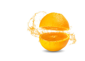 Orange cut in half with a splash of juice