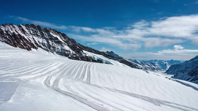 Aerial view of Great Aletsch Glacier, the largest glacier in the Alps and UNESCO heritage, in Canton of Valais, Switzerland. Aletsch glacier - ice panorama landscape in Alps of Switzerland, Europe
