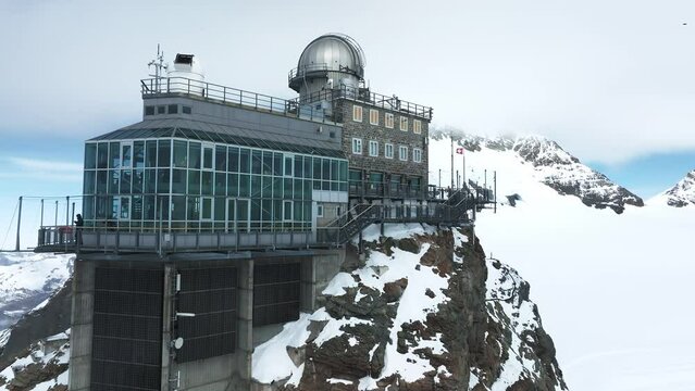 Aerial panorama view of the Sphinx Observatory on Jungfraujoch - Top of Europe, one of the highest observatories in the world located at the Jungfrau railway station, Bernese Oberland, Switzerland.