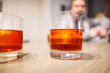 Man drinking Negroni's
