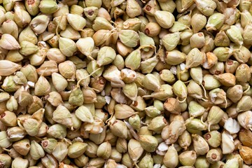 Top view closeup shot of a heap of buckwheat