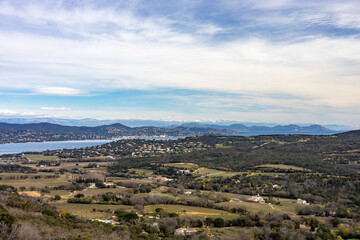 Panoramic view from Gassin over the Golf of St. Tropez with snow covered mountains, Côte d'Azur, France