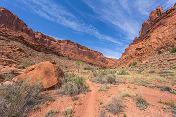 hiking the syncline loop trail in island in the sky district of canyonlands national park, utah, usa