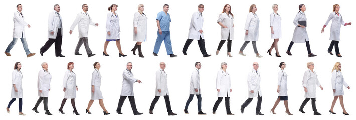 Fototapeta na wymiar group of doctors in motion isolated on white