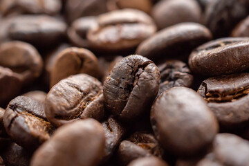 Fresh roasted brown coffee beans background