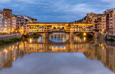 Ponte Vecchio bridge over Arno river at night, Florence, Italy