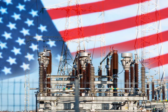 High voltage circuit breaker in a power substation.Electric power transmission lines in the evening. High voltage switchgear and equipment of power plant.Usa flag background. - Powered by Adobe