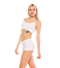 Fototapeta premium Young beautiful blonde woman in white sports underwear
