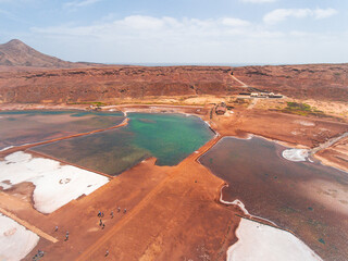 Stunning aerial photos showcase the natural beauty and unique features of Pedra de Lume Saline in Sal Island, Cabo Verde. Witness the salt mines and picturesque village from above.