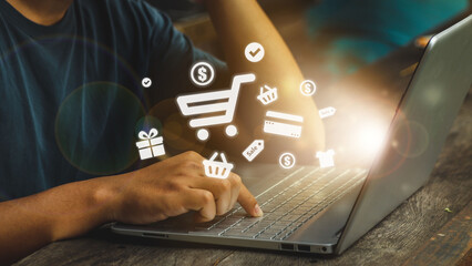 customer shopping online with laptop