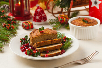 Small, baked patties in Christmas decoration. Front view.