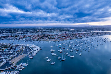 Aerial landscape view of Newport Beach, Orange County with aligned boats and ships, California