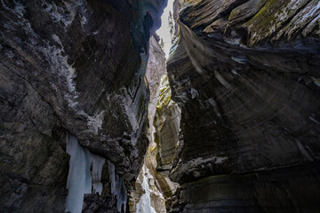 inside view of frozen river of maligne canyon in jasper national park
